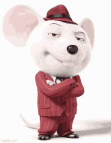 a cartoon mouse is wearing a red suit and a hat