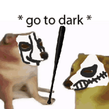 a dog with a skeleton mask on its face is holding a bat next to another dog .