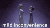 a man and a woman are standing next to each other and the words mild inconvenience are on the bottom
