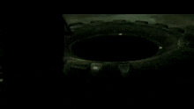 a blurred image of a person holding a cake