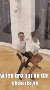 a man and a woman are dancing in a dance studio and the caption says " when bro put on dat shae davis "