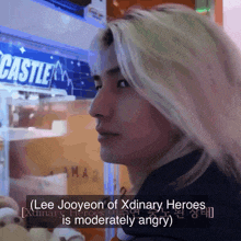 lee jooyeon of xdinary heroes is moderately angry on a screen
