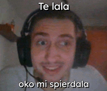 a man wearing headphones with a caption that says te lala