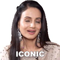 a woman with her eyes closed is wearing earrings and the word iconic is on her face