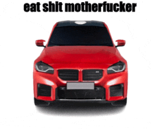 a red car with the words eat shit motherfucker written on it