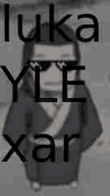 a picture of a man wearing sunglasses and a kimono with the words luka yle xair written on it .