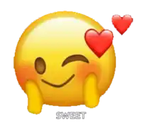 a yellow smiley face with a red heart over its eyes and the word sweet below it