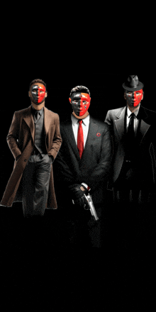 three men in suits and red masks are standing together