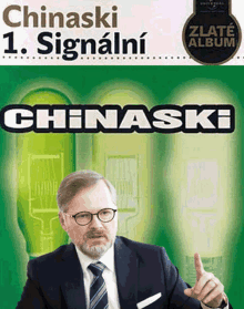 a man in a suit and tie is giving a thumbs up in front of a green light bulb that says chinaski on it