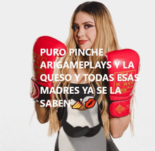 a woman wearing red boxing gloves says puro pinche