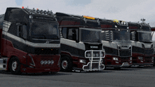 a row of scania trucks are parked next to each other in a parking lot