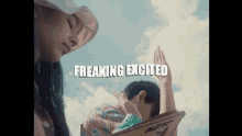 a man and a woman are standing next to each other in front of a blue sky with the words `` freaking excited '' .