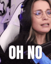 a woman wearing glasses and headphones is saying " oh no "