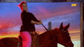 a woman is riding a horse in front of a bbbo sign