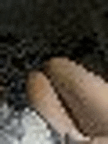 a close up of a person 's feet with a black background .