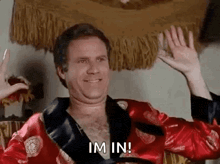 a man in a red robe is waving his hands and saying `` i 'm in ! ''