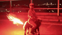 a man is riding a pony with fire coming out of its tail