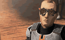 a close up of a man wearing goggles with the letter h on it