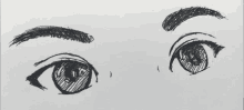 a black and white drawing of a woman 's eyes