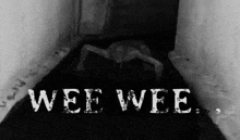 a black and white photo of a monster with the words wee wee written on it