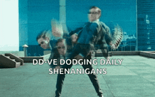 a man in a suit is doing a dance with the words dd-ve dodging daily shenanigans