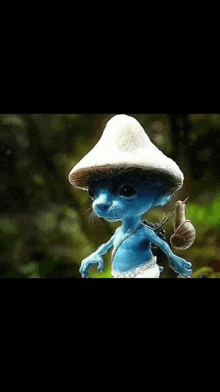 a blue smurf wearing a mushroom hat and holding a snail on his back .