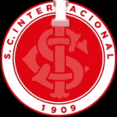 a red and white emblem with the year 1909 on it