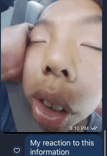 a screenshot of a child 's face with the words my reaction to this information at the bottom