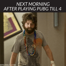 a man with a beard and beads around his neck is next morning after playing pubg