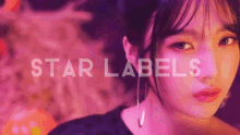 a close up of a woman 's face with the words star labels in the background .