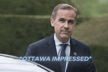 a man in a suit and tie is standing next to a car with ottawa impressed written on the bottom