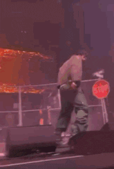 a blurry picture of a crowd at a concert .