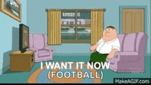 peter griffin from family guy is sitting on a couch in a living room watching football .