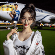 a woman wearing glasses and a mixparla shirt