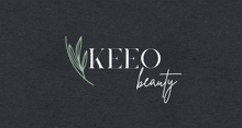 a logo for keeo beauty with a leaf on it