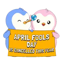 a couple of penguins holding an orange sign that says april fools day is cancelled this year