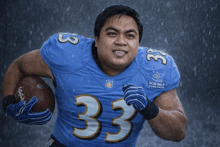 a football player with the number 33 on his shirt