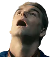 a man looks up with his mouth open