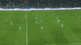 a blurry picture of a soccer player wearing a number 9 jersey