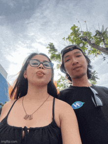 a man and a woman are posing for a picture with imgflip.com at the bottom of the image