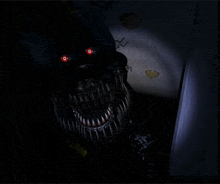 a monster with red eyes is standing in a dark room with balloons on the wall