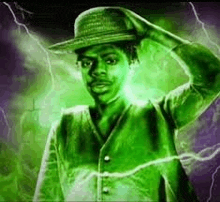 a man wearing a hat is standing in front of a green lightning storm .