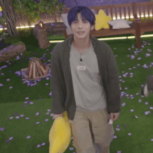 a young man with blue hair is standing in front of a wooden bench holding a yellow stuffed animal .