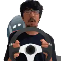 a man with glasses is holding a steering wheel in his hands