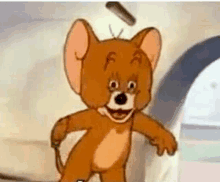 jerry from tom and jerry is smiling and holding a stick in his hand .