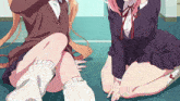 a couple of anime girls sitting on the floor