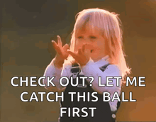 a little girl making a funny face with the words check out let me catch this ball first on the bottom