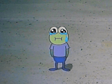 a cartoon frog is crying with a tear running down his face