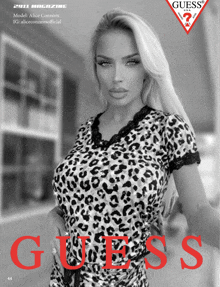 a model wearing a leopard print shirt is on the cover of guess magazine