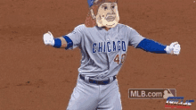 a baseball player wearing a chicago 40 jersey with a cartoon face on his face